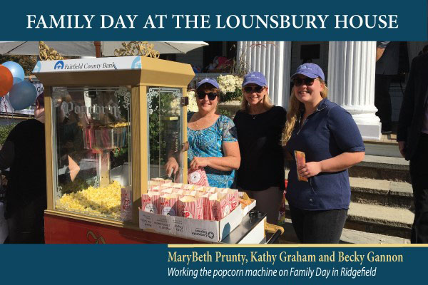 MaryBeth Prunty, Kathy Graham and Becky Gannon working the popcorn machine on Family Day in Ridgefield.